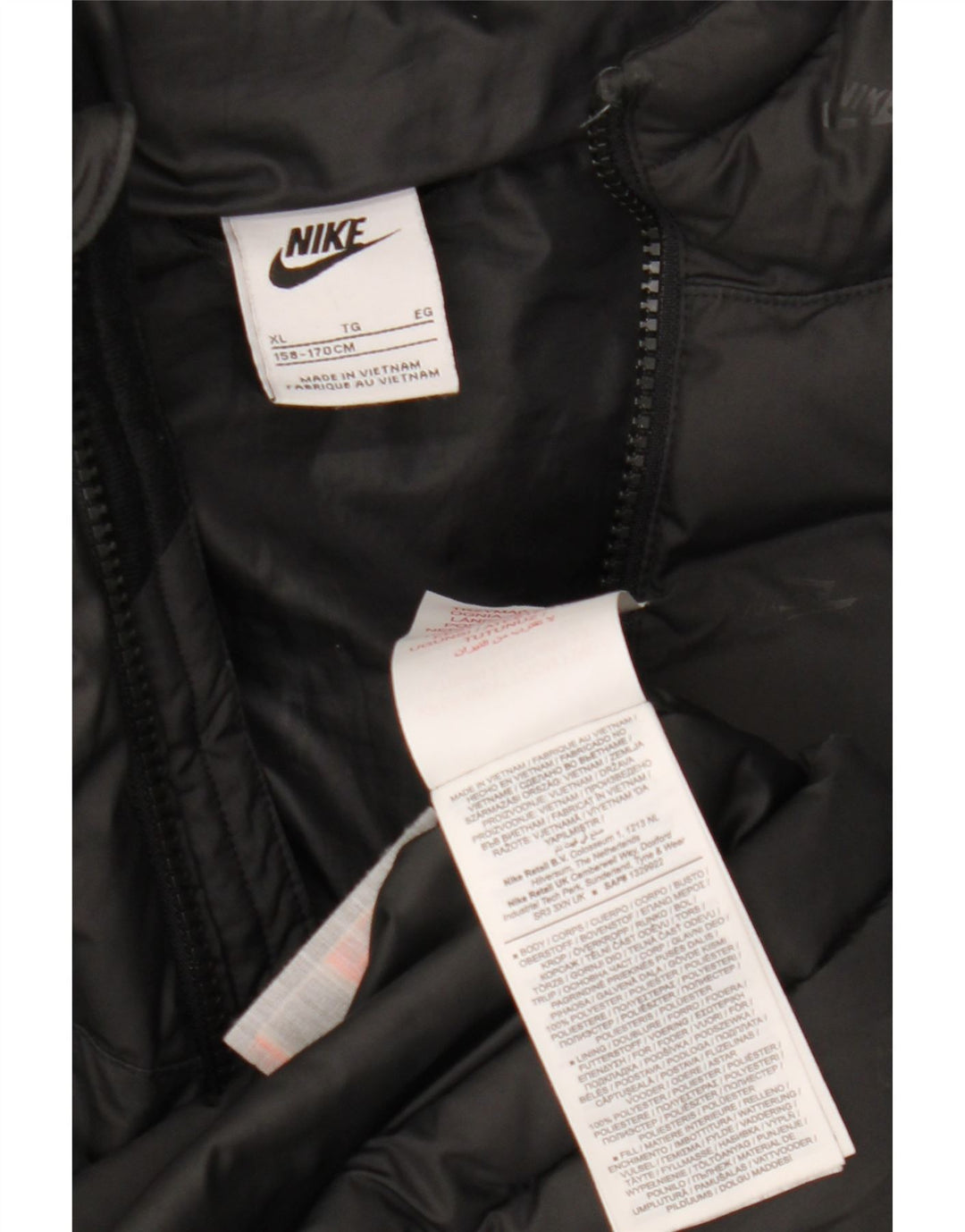 Jaqueta acolchoada com capuz gráfico Nike Boys 13-14 anos XL preto poliéster