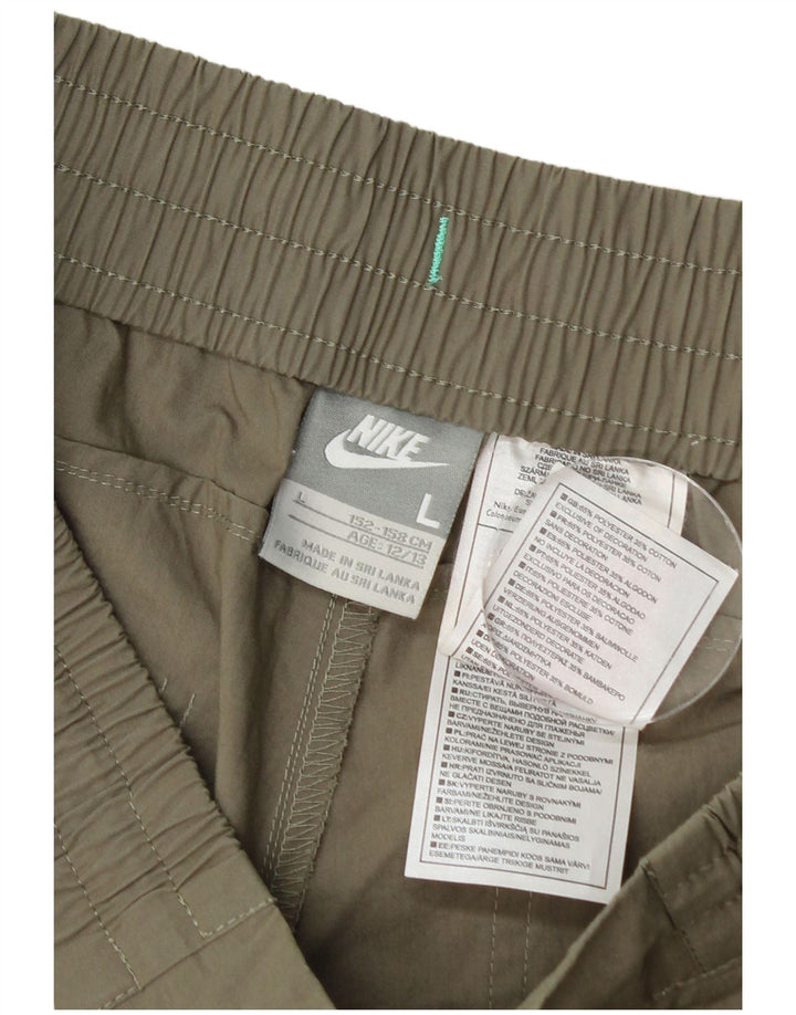 Shorts casuais Nike Boys 12-13 anos grandes W28 cáqui poliéster
