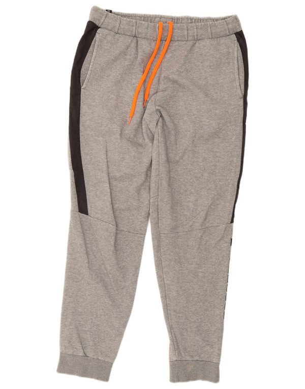 Calça esportiva masculina Puma Graphic Joggers grande cinza colorblock algodão