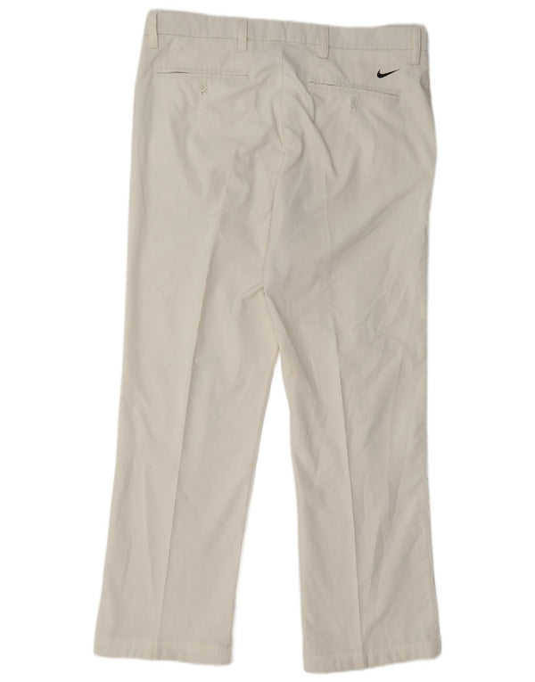 Calças Chino masculinas Nike Golf cintura baixa W34 L30 poliéster branco