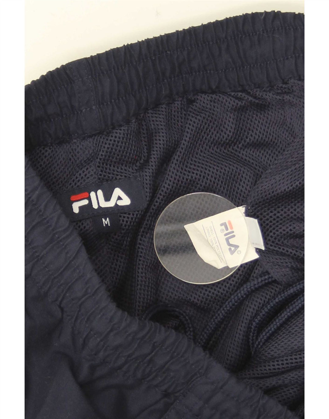 Bermuda esportiva Fila masculina gráfica bermuda média azul marinho colorblock