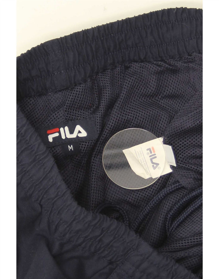 Bermuda esportiva Fila masculina gráfica bermuda média azul marinho colorblock