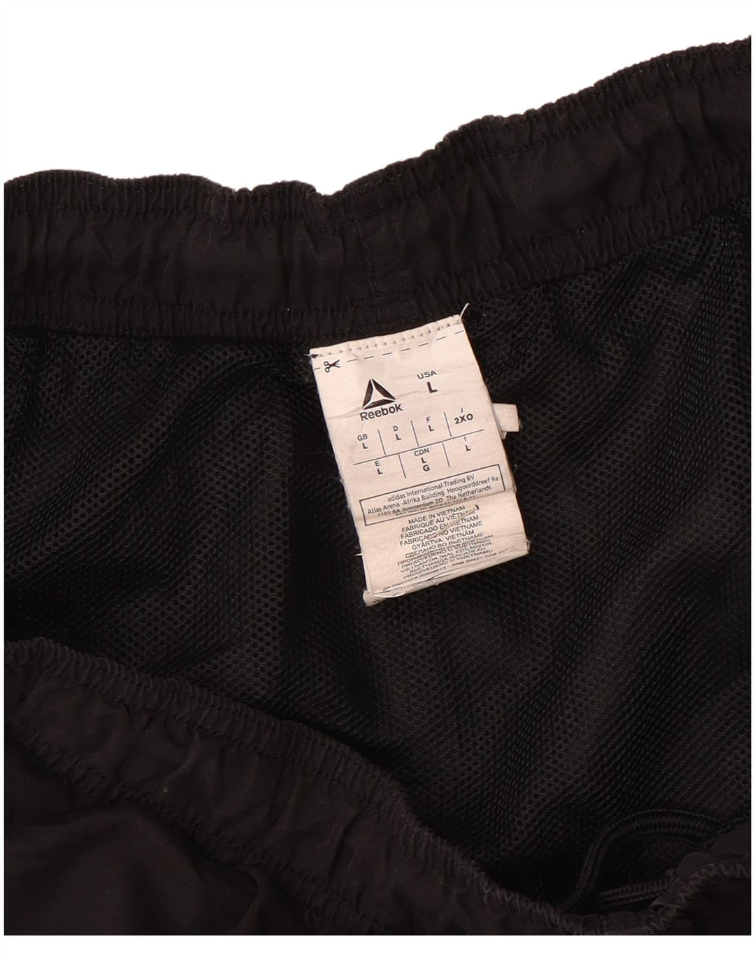 Shorts esportivos masculinos Reebok grande poliéster preto