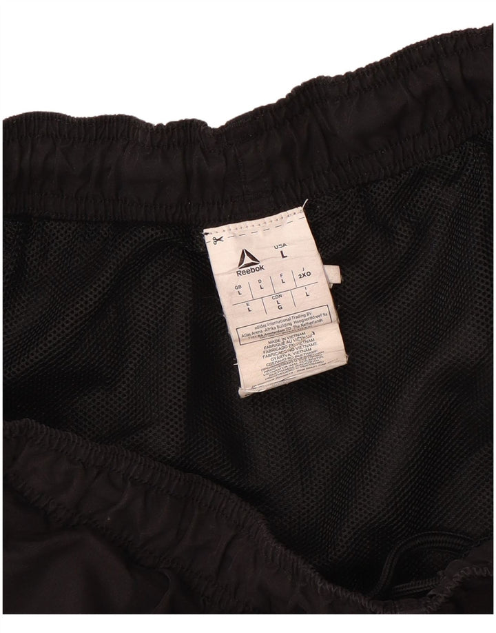 Shorts esportivos masculinos Reebok grande poliéster preto