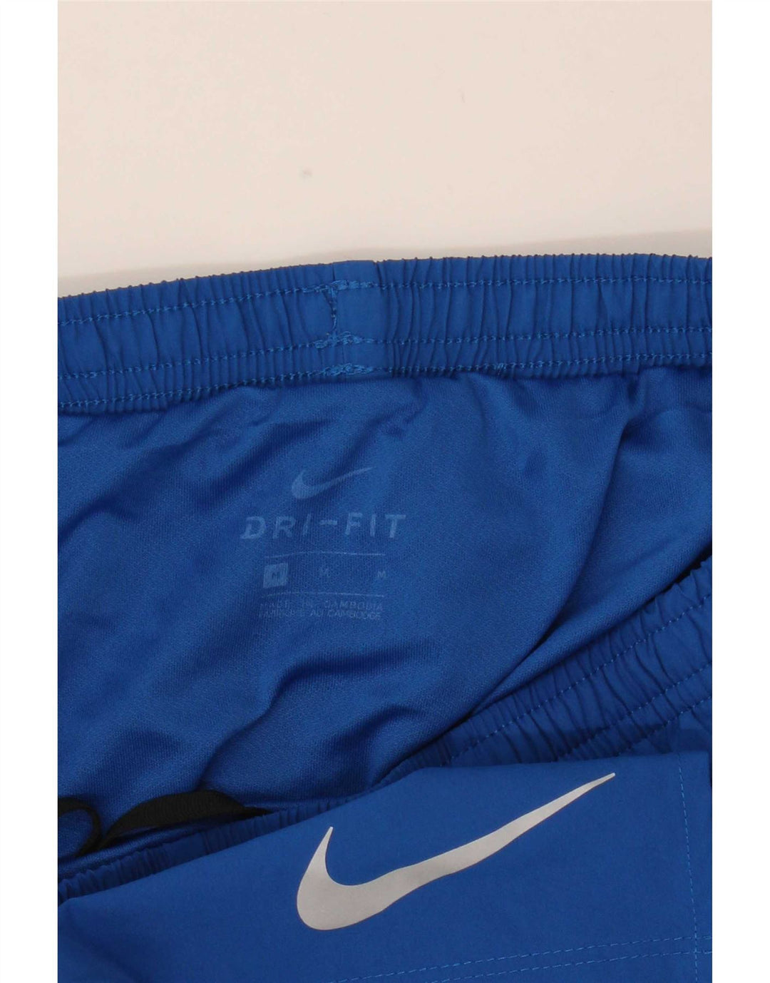 Shorts esportivos masculinos Nike Dri Fit médio azul colorblock