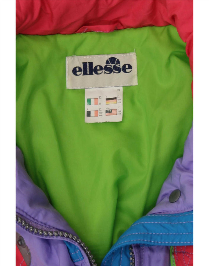 Macacão de esqui feminino Ellesse IT 44 poliéster colorblock roxo médio