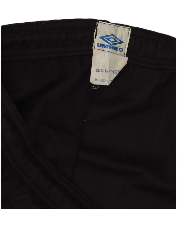 Shorts esportivo masculino Umbro grande poliéster listrado preto