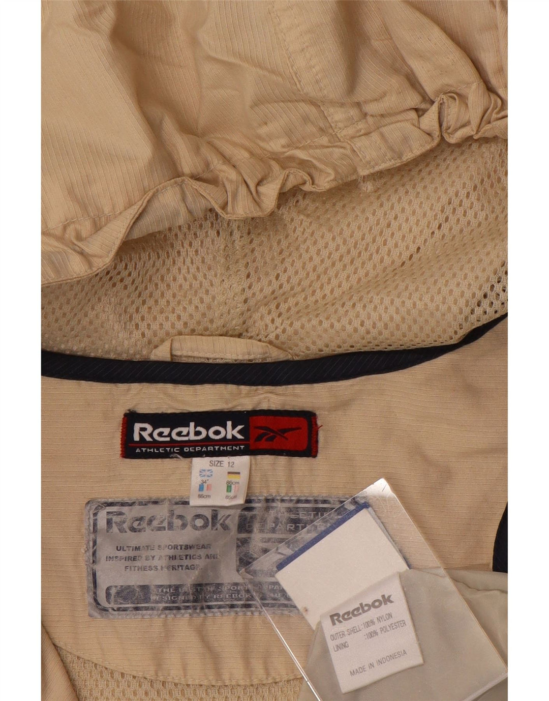 Jaqueta de chuva feminina Reebok com capuz e pulôver UK 12 Medium Beige Colourblock