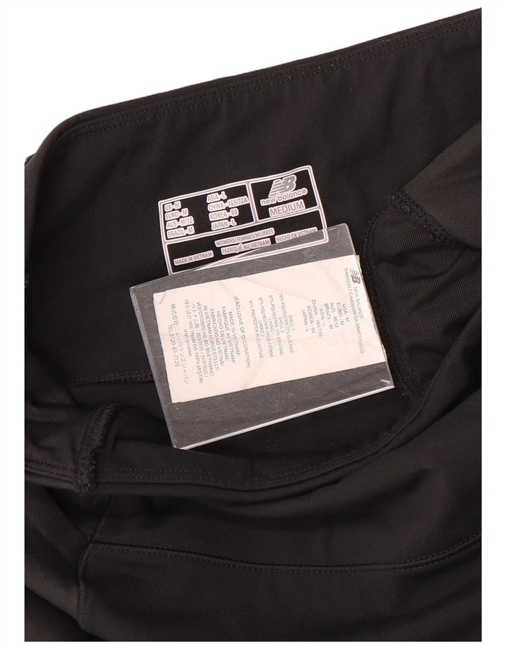 Leggings femininos New Balance UK 12 poliéster preto médio