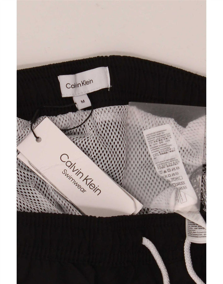 Shorts de natação masculino Calvin Klein gráfico médio preto poliéster