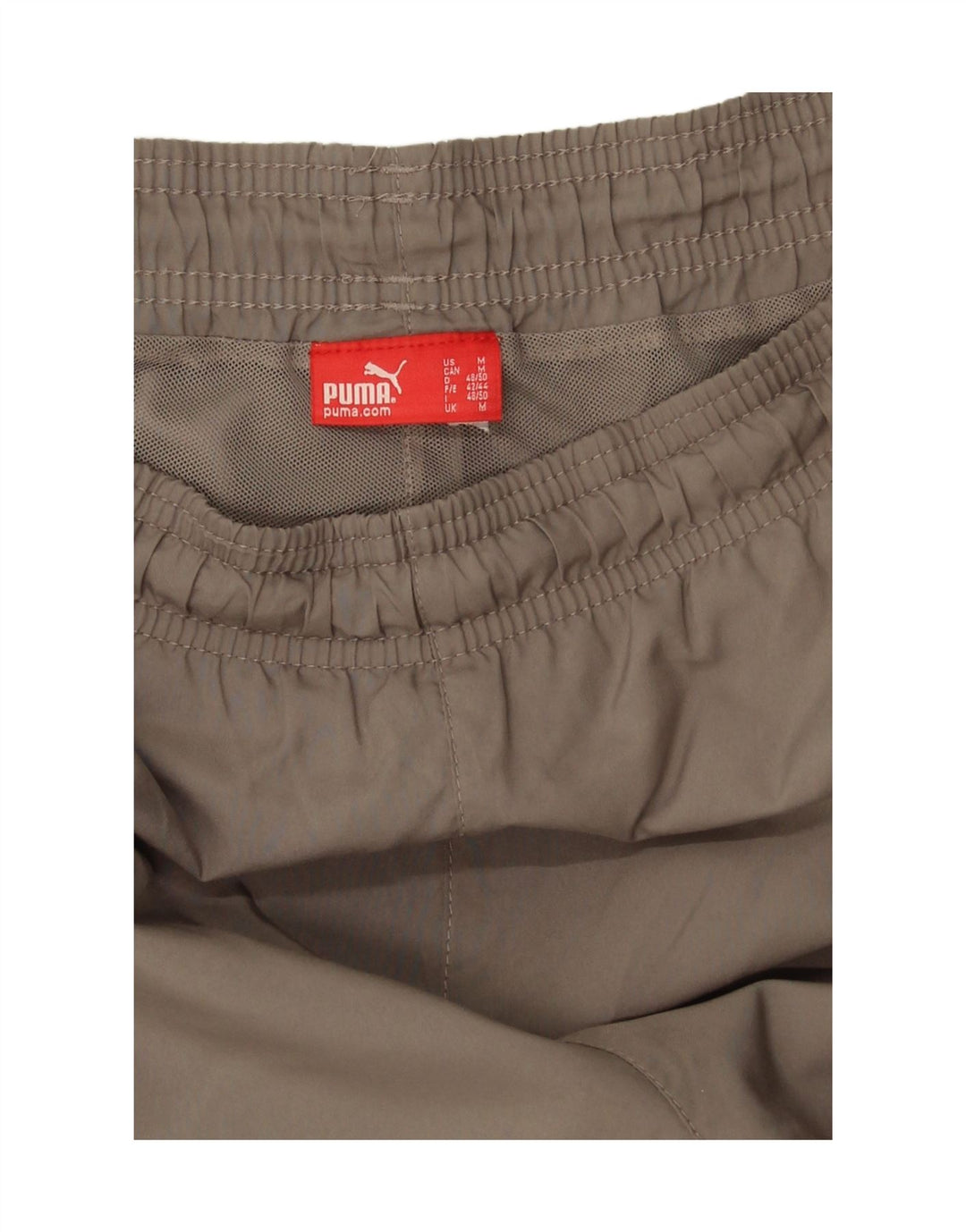 Shorts esportivos gráficos masculinos Puma médio marrom