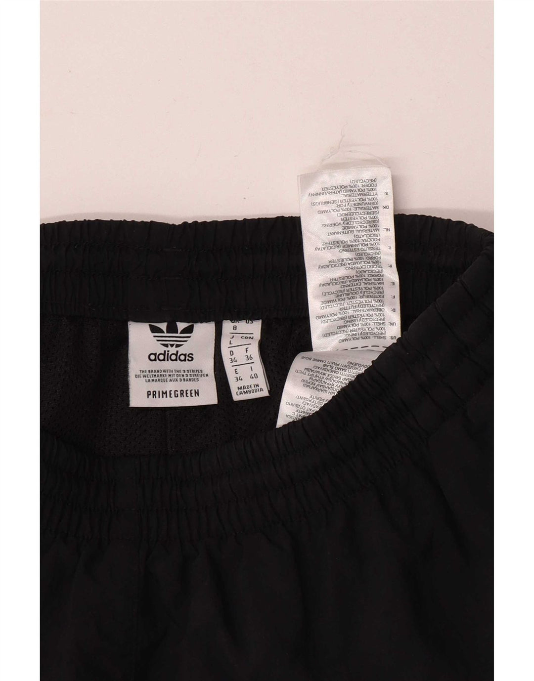 Shorts esportivos femininos Adidas UK 8 pequeno poliéster preto
