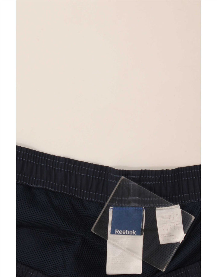 Calça de treino masculina Reebok Graphic grande poliéster azul marinho