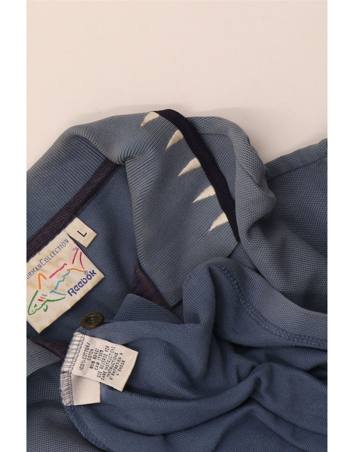 Camisa pólo gráfica masculina Reebok grande algodão azul