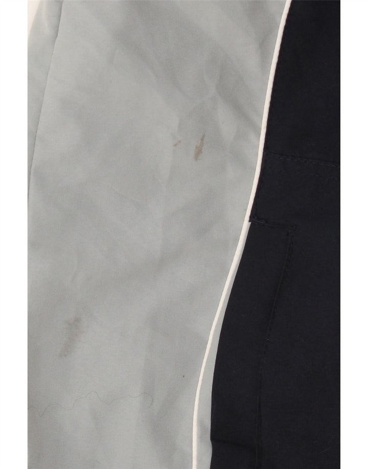 Jaqueta masculina de agasalho Champion grande poliéster colorblock azul marinho