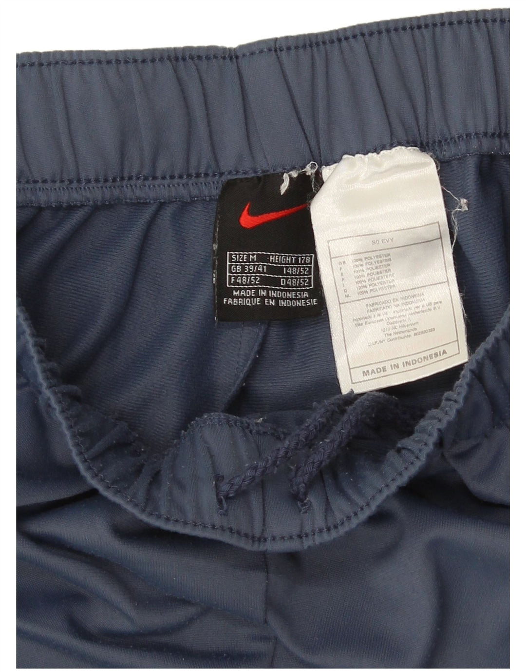 Calça de treino Nike masculina gráfica UK 39/41 poliéster azul médio