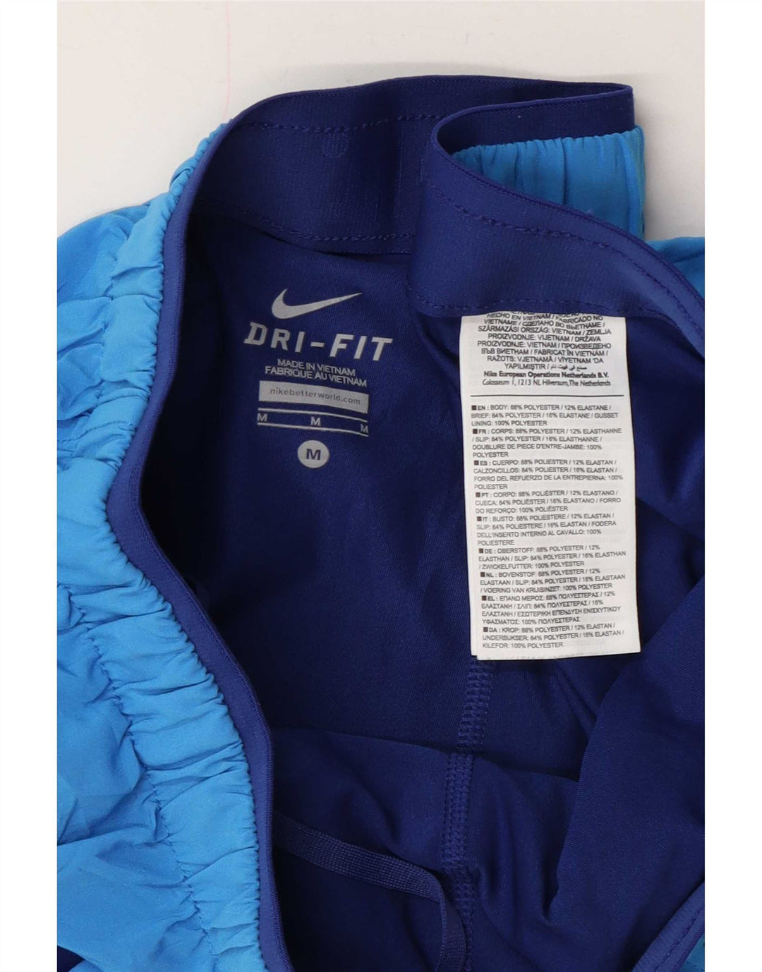 Shorts esportivos femininos Nike Dri Fit UK 12 poliéster azul médio