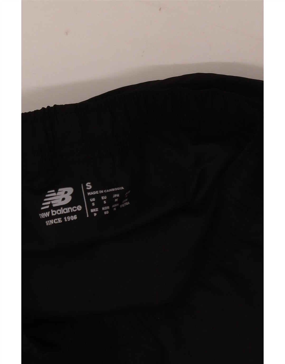 Shorts esportivos masculinos New Balance pequenos poliéster preto