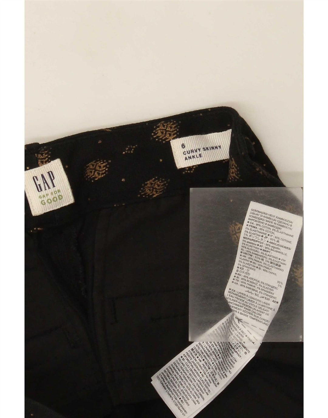 Calça feminina casual com estampa abstrata curvilínea Gap US 6 médio W26 L27 preta