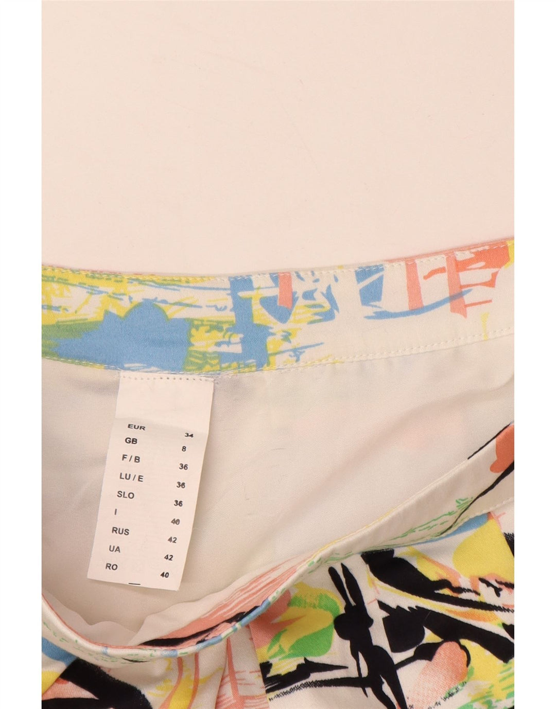 Mini saia feminina VINTAGE com padrão abstrato Reino Unido 8 pequena W28 multicolorida