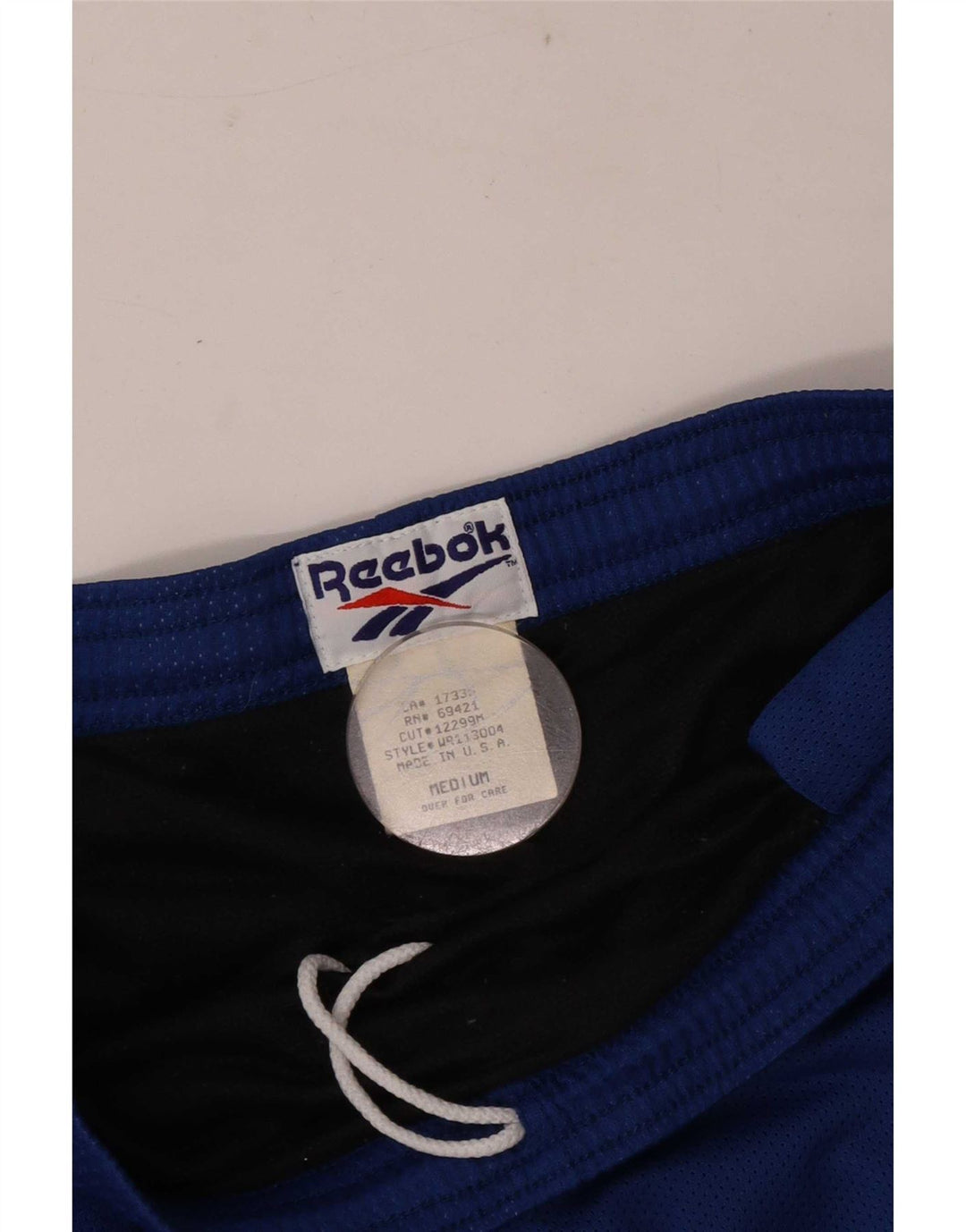 Shorts esportivos regulares masculinos Reebok médio azul poliéster