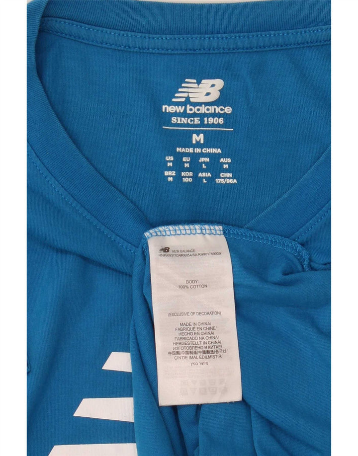 Camiseta gráfica masculina New Balance algodão azul médio
