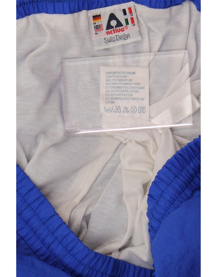 Calça de treino feminina ACTIVE Joggers UK 14 poliamida azul médio