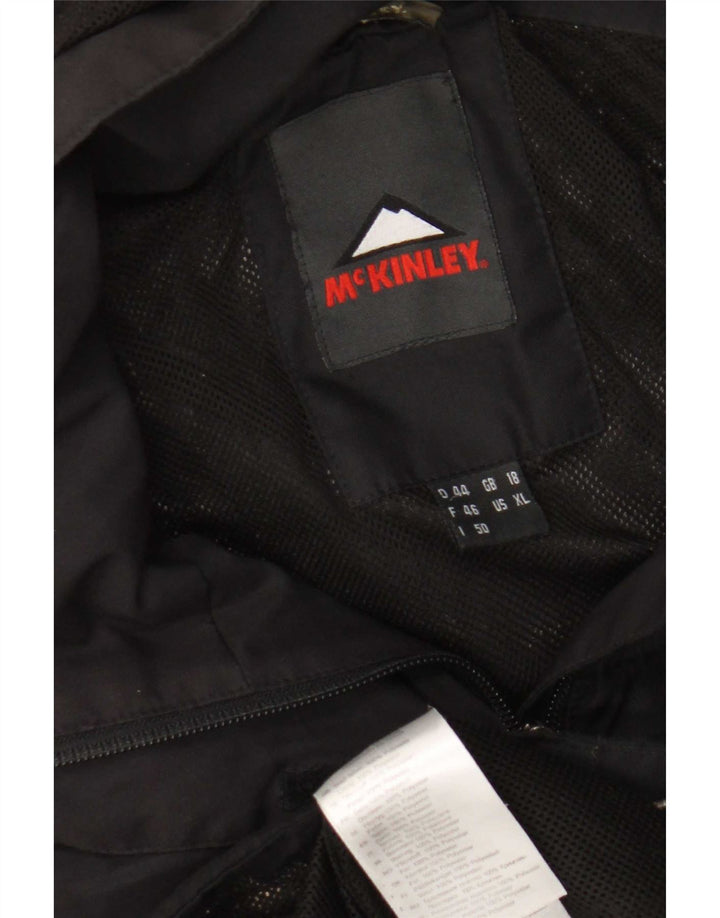 Jaqueta corta-vento feminina MC Kinley com capuz Reino Unido 18 XL preto poliamida