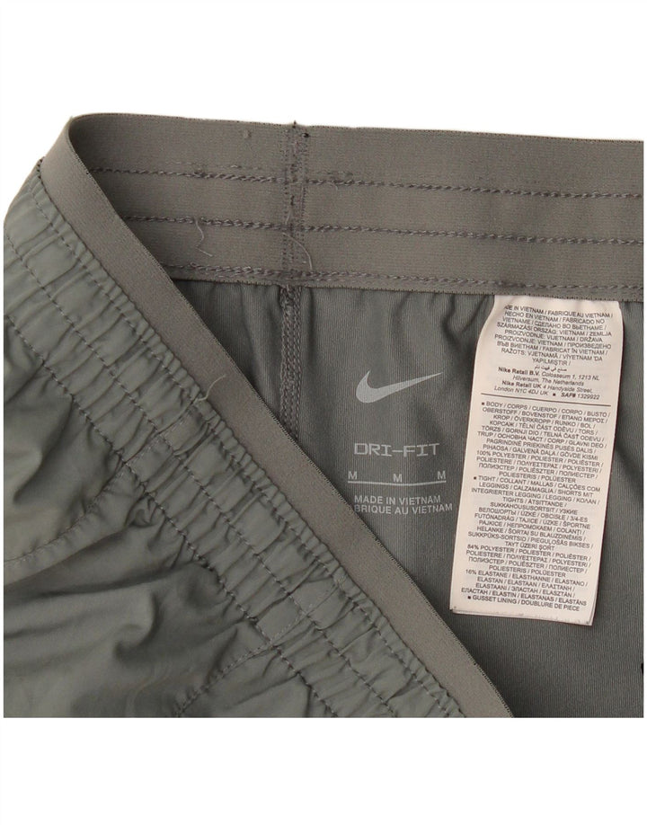 Shorts esportivos femininos Nike Dri Fit UK 14 poliéster cinza médio