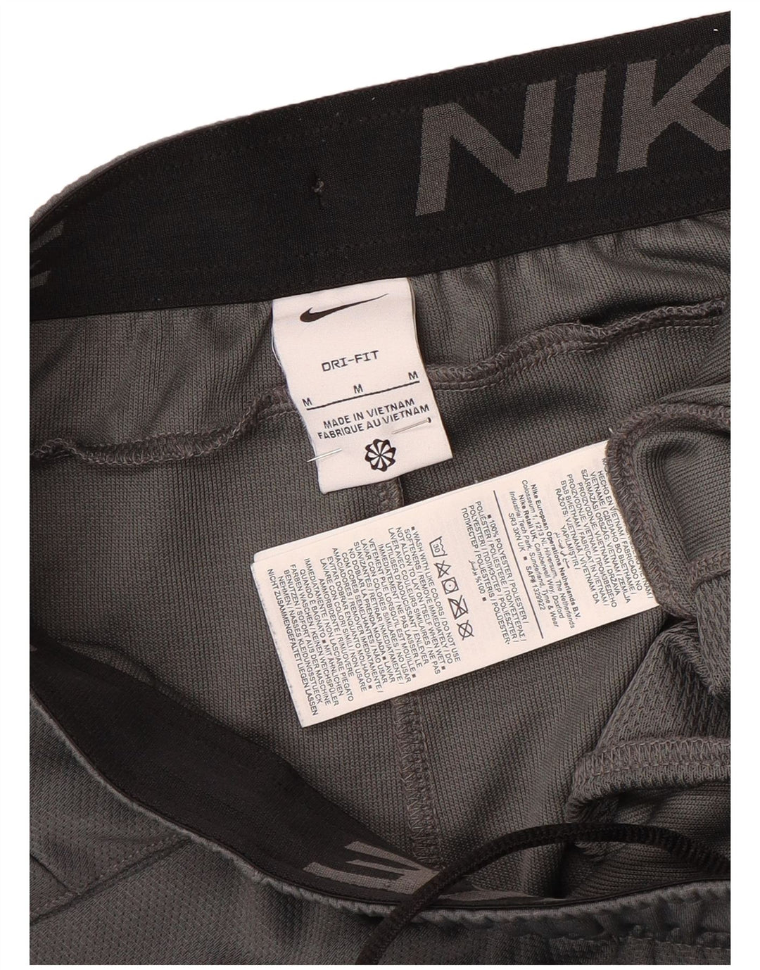 Shorts esportivos masculinos Nike Dri Fit cinza médio colorblock poliéster