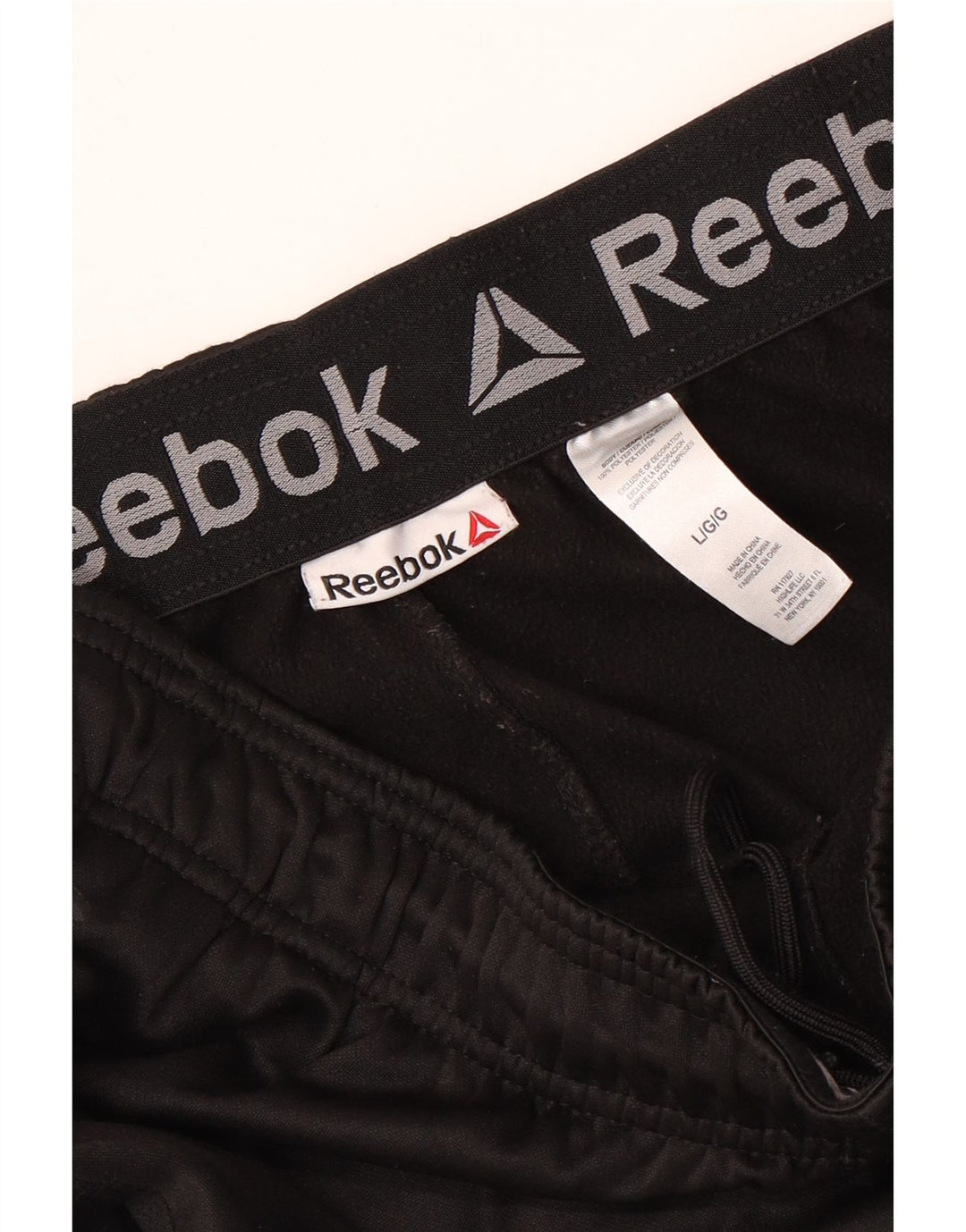 REEBOK Calça de treino masculina Joggers grande poliéster preto