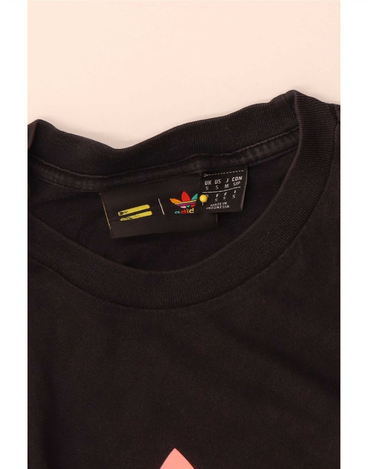 Camiseta feminina Adidas Pharrell Williams com estampa gráfica pequena de algodão preto