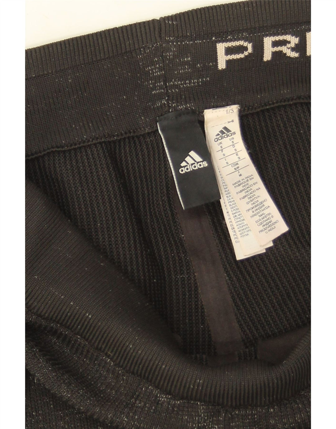 Calça de treino masculina Adidas pequena preta manchada de poliéster