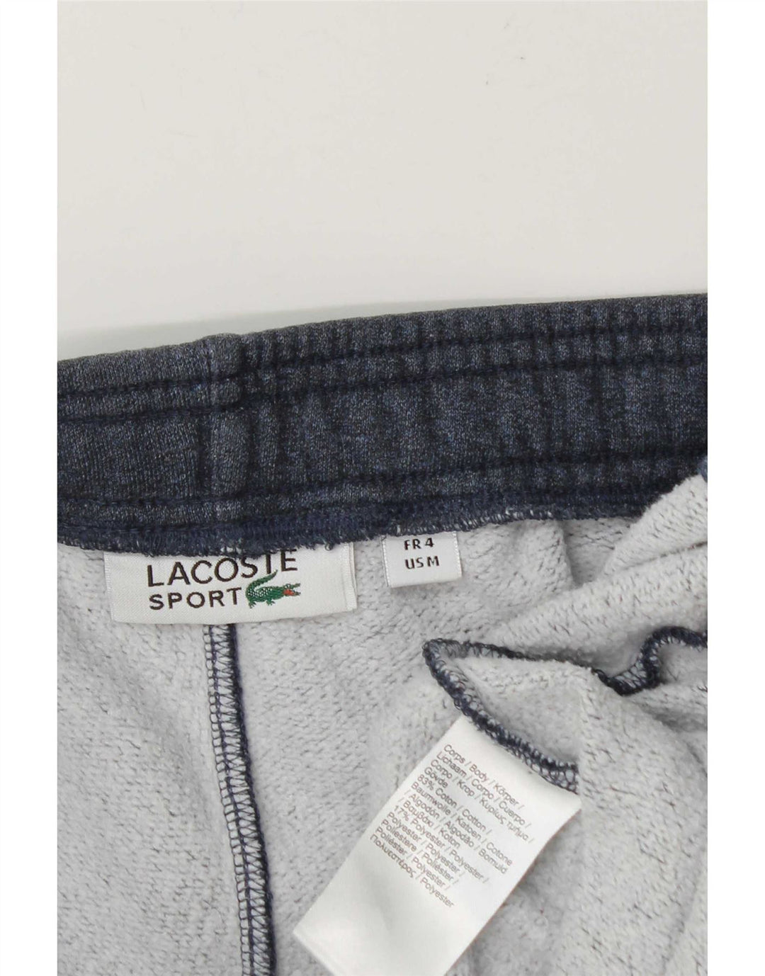 Calça esportiva masculina Lacoste tamanho 4 azul marinho médio manchado