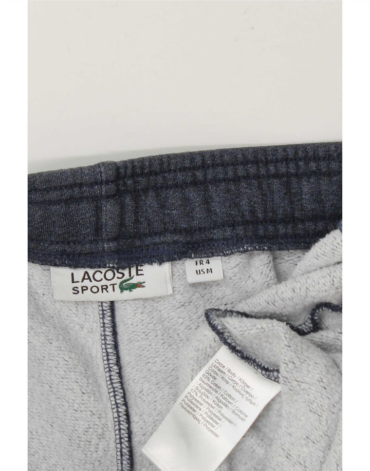 Calça esportiva masculina Lacoste tamanho 4 azul marinho médio manchado