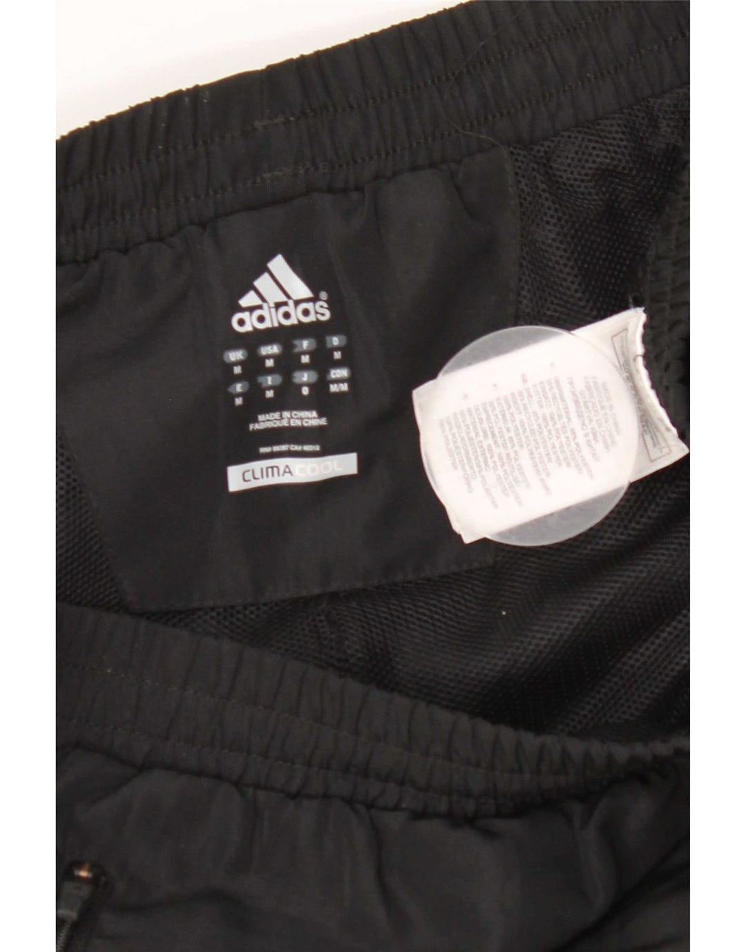 Calça de treino masculina Adidas Climacool médio preto colorblock poliéster