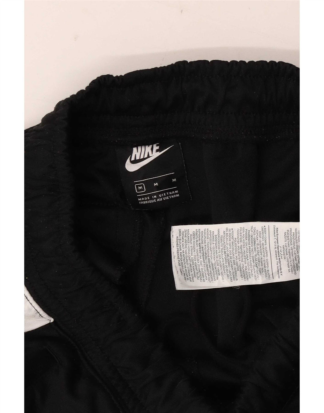 Calça de treino masculina Nike Dri Fit médio preto colorblock poliéster
