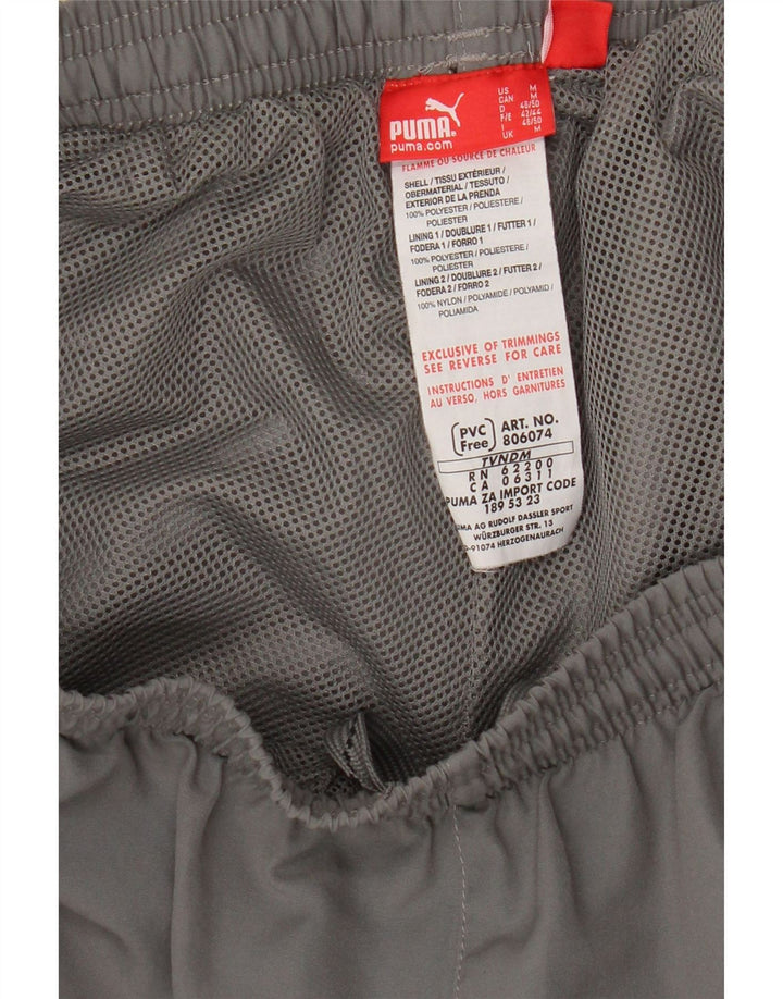 Calça de treino masculina Puma Graphic cinza médio poliéster