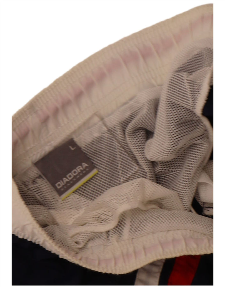 Shorts esportivos gráficos masculinos Diadora grande bloco colorido azul marinho