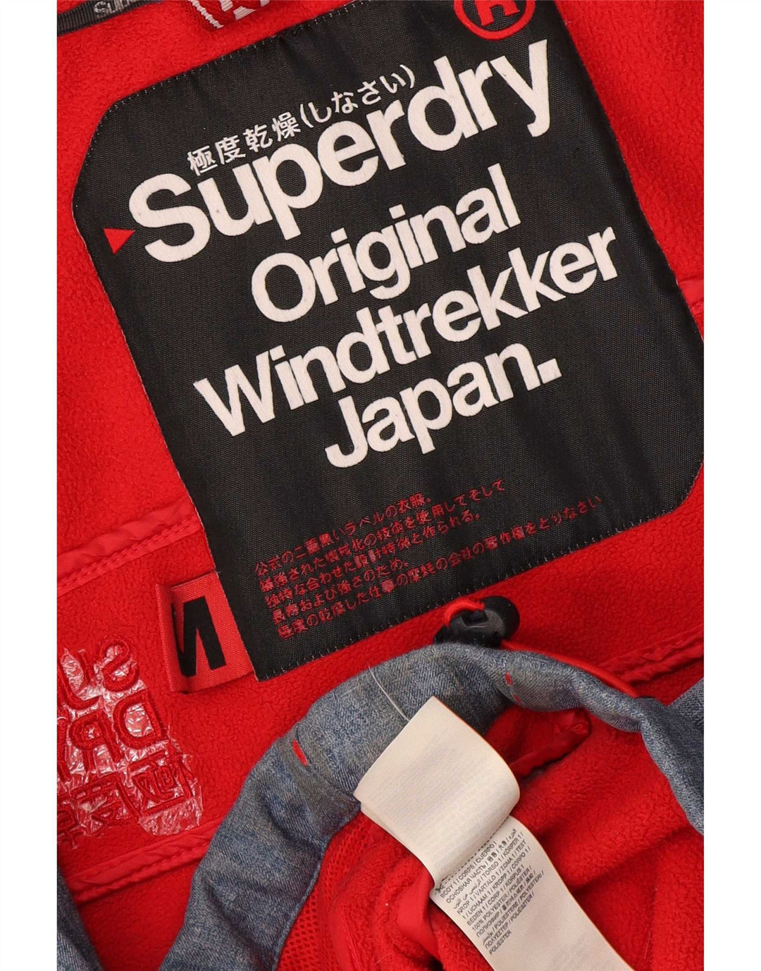 Jaqueta corta-vento masculina Superdry Windtrekker Graphic UK 38 azul médio