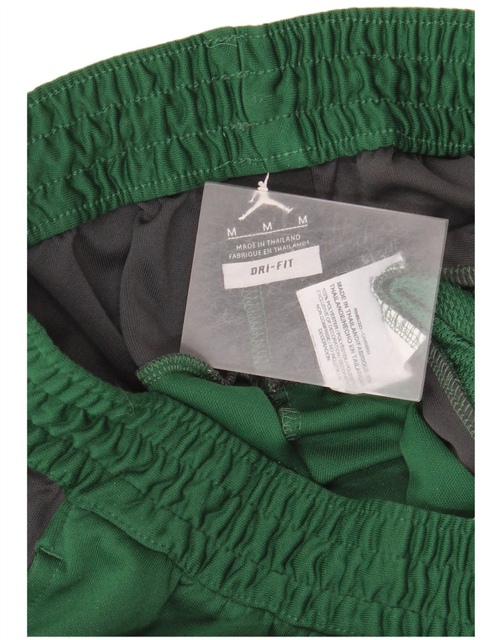 Calça de treino masculina Jordan Dri Fit em poliéster colorblock verde médio