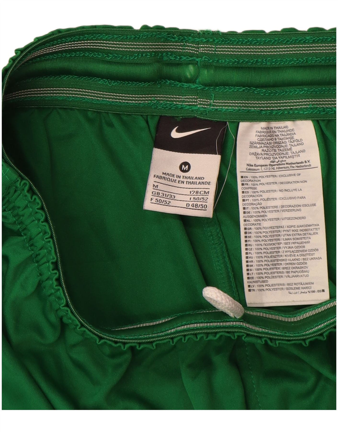 Shorts esportivos gráficos masculinos Nike poliéster verde médio