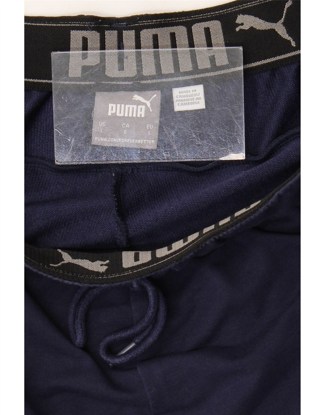 Calça de treino masculina PUMA grande bloco colorido azul marinho