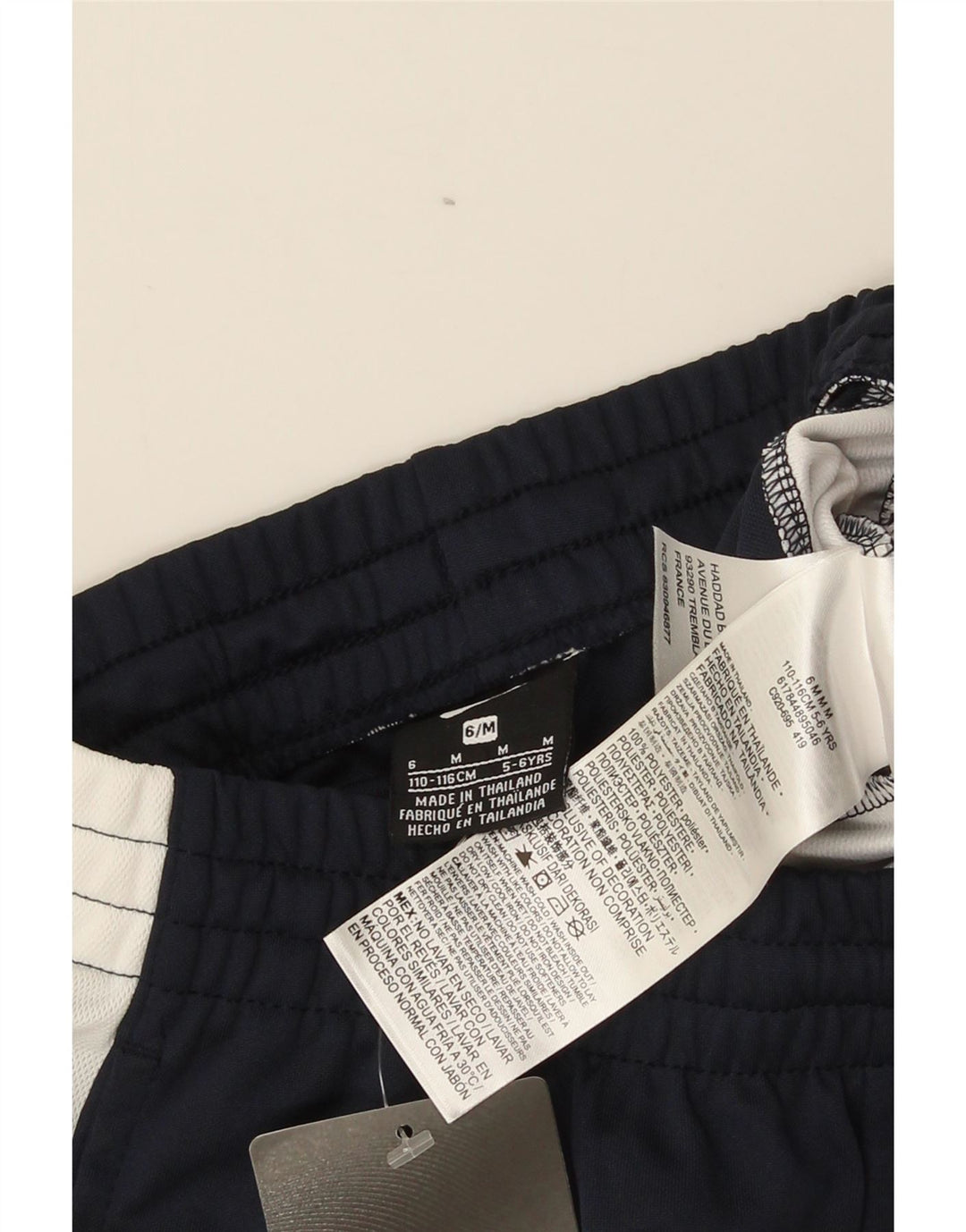 Calça de treino Nike Boys 5-6 anos médio azul marinho colorblock