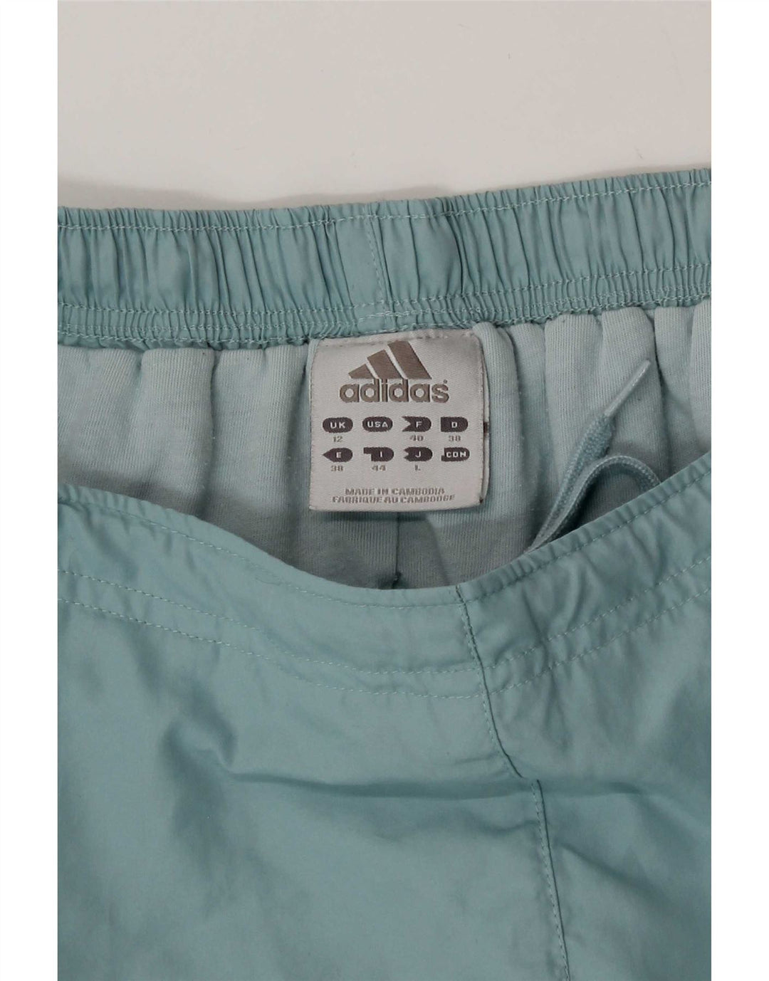 Calça corta-vento feminina Adidas UK 12 poliéster azul médio