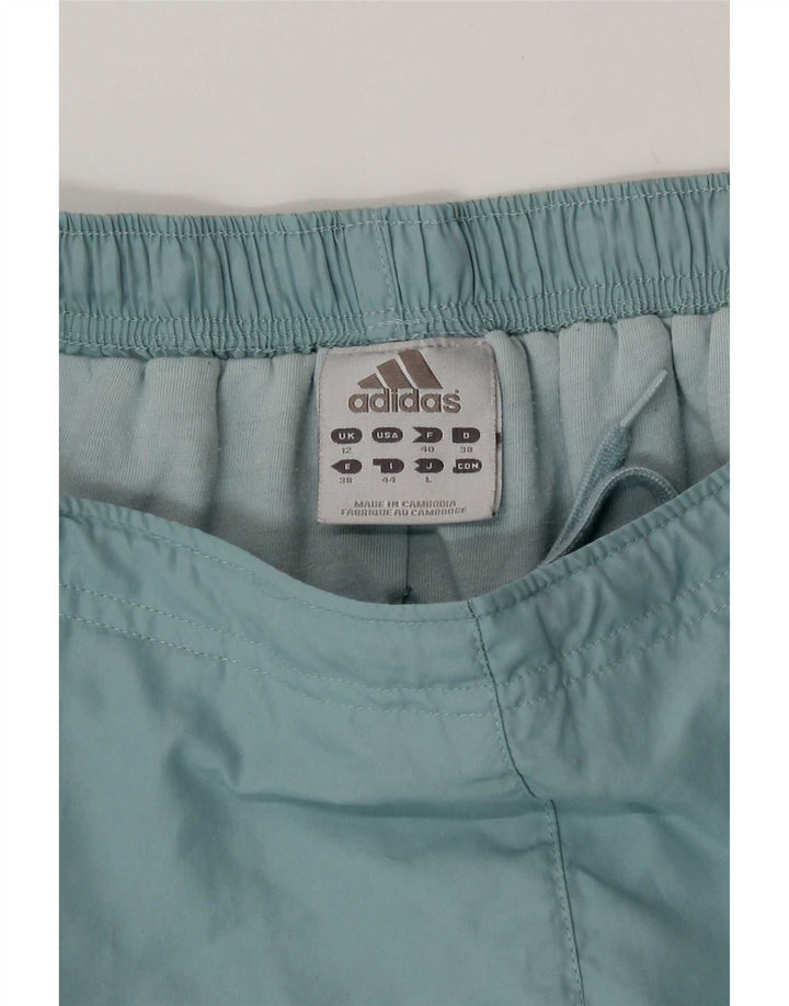 Calça corta-vento feminina Adidas UK 12 poliéster azul médio