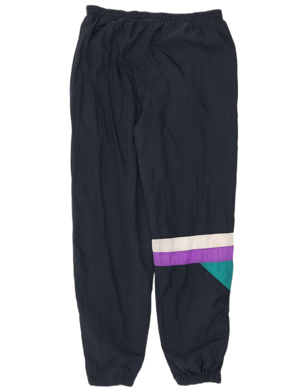 Calça de treino masculina Jako Joggers 2XL azul marinho Colourblock Nylon