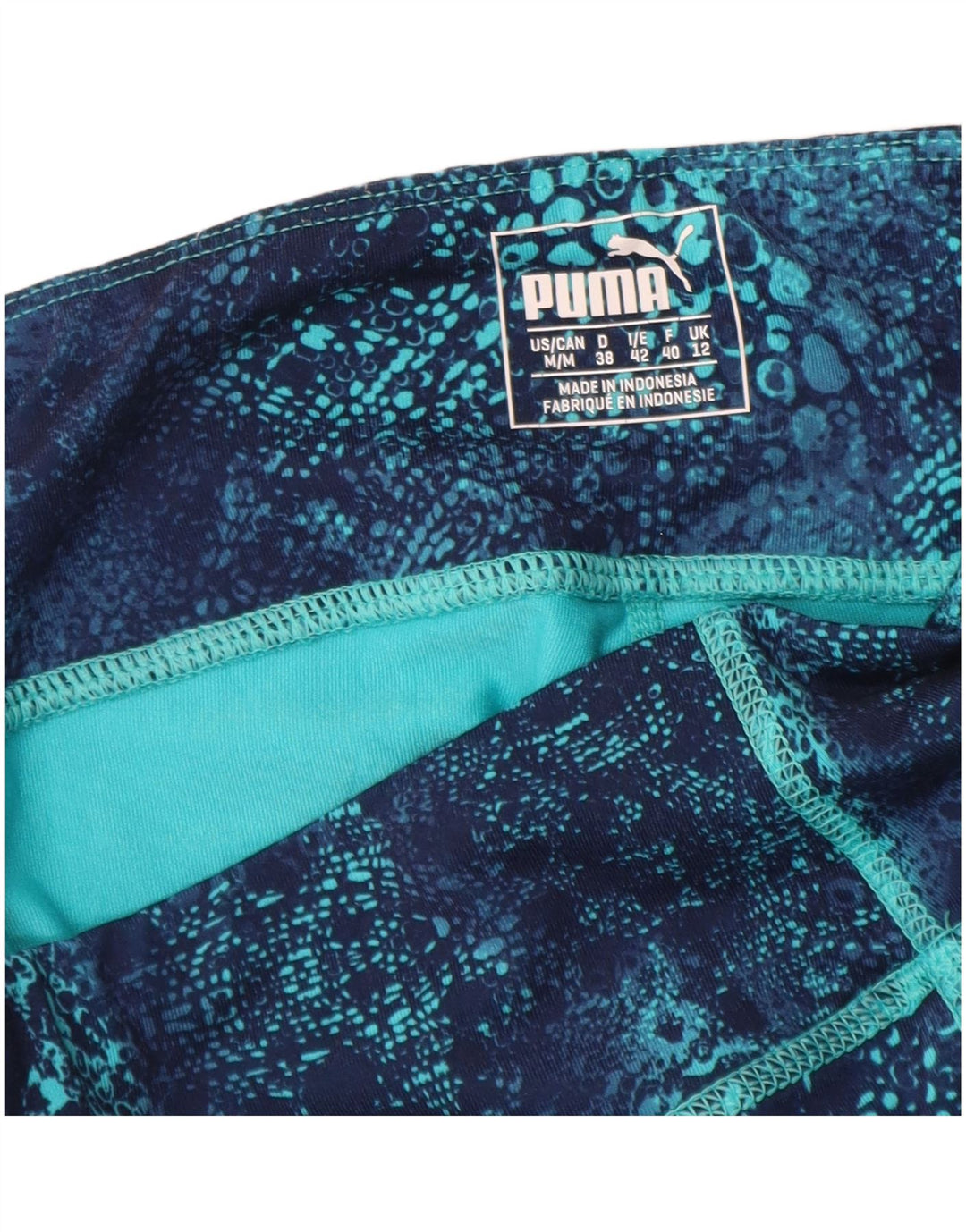 PUMA Womens Abstract Pattern Capri Leggings Reino Unido 12 Poliéster Azul Médio