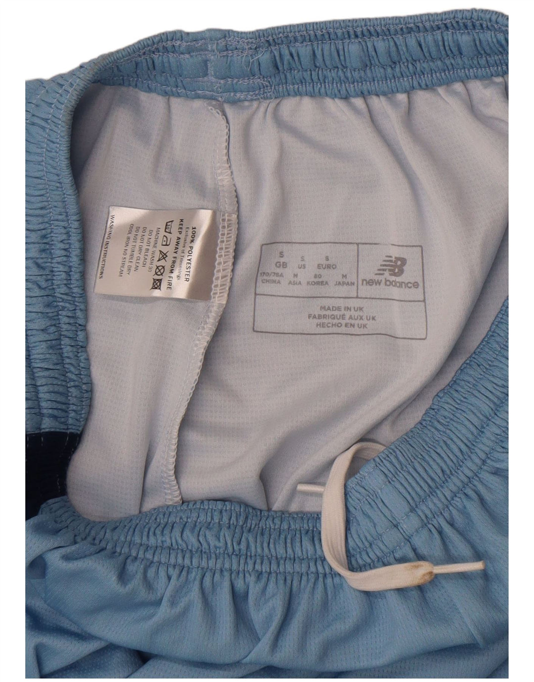 Shorts esportivos masculinos New Balance em poliéster azul pequeno Colourblock