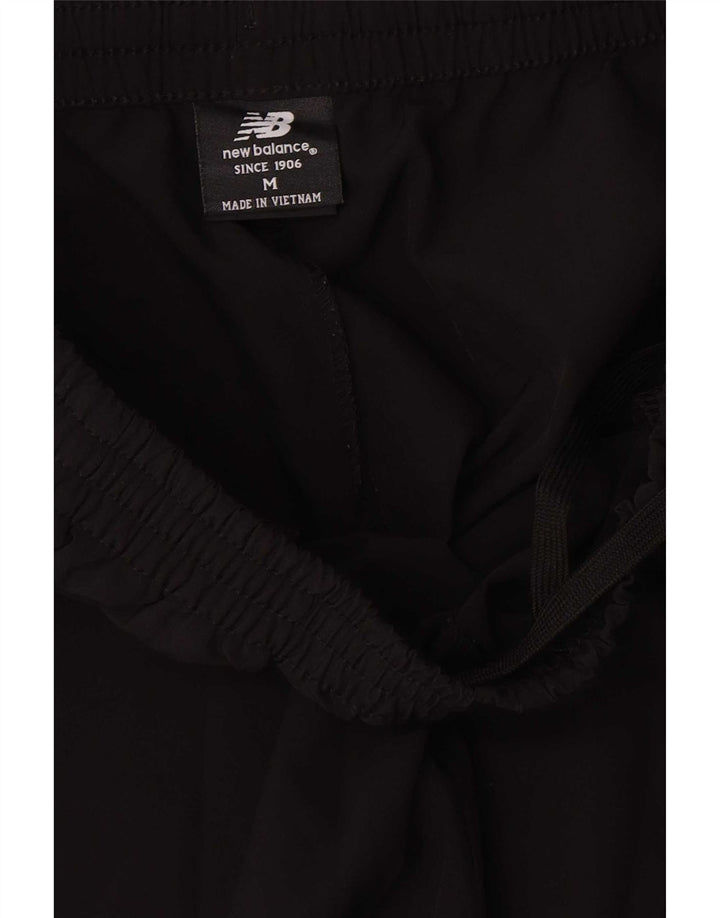 Calça de treino feminina New Balance UK 14 poliéster preto médio